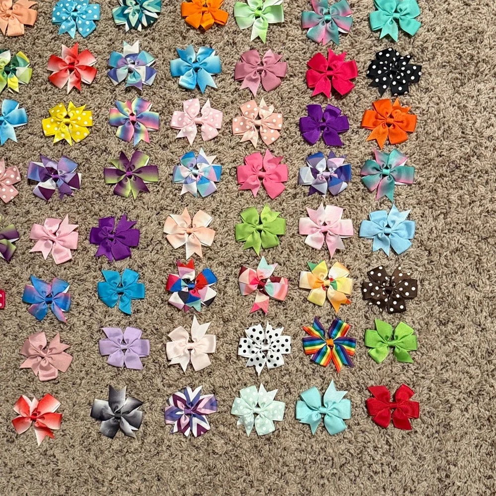 Bundle of 117 girls bow barrettes lots of variety but there are doubles